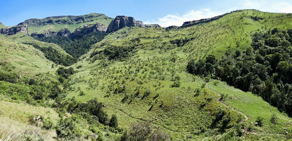Green valleys below the Drakensberg mountains